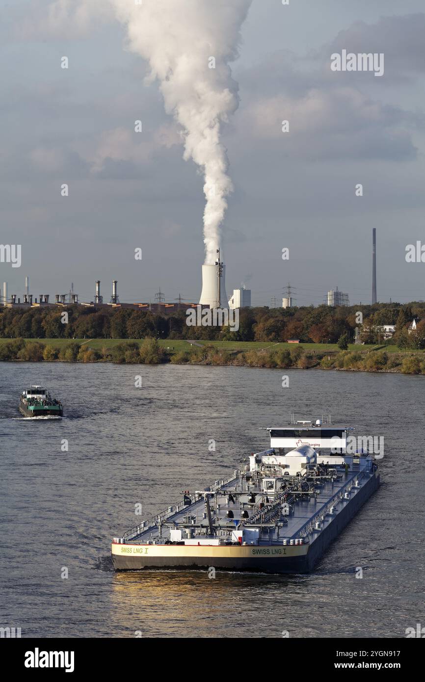 Barge on the Rhine near Duisburg-Laar, column of smoke above the cooling tower of the Thyssenkrupp steelworks, Duisburg, North Rhine-Westphalia, Germa Stock Photo