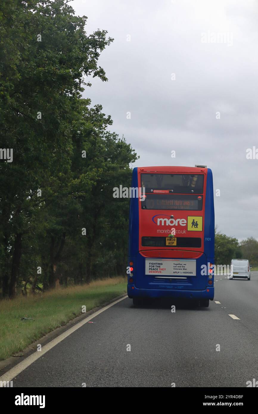 Lychett Minster, England. 30 September 2024. A double decker bus heading for Lychett Minster, viewed from the vehicle behond. Stock Photo