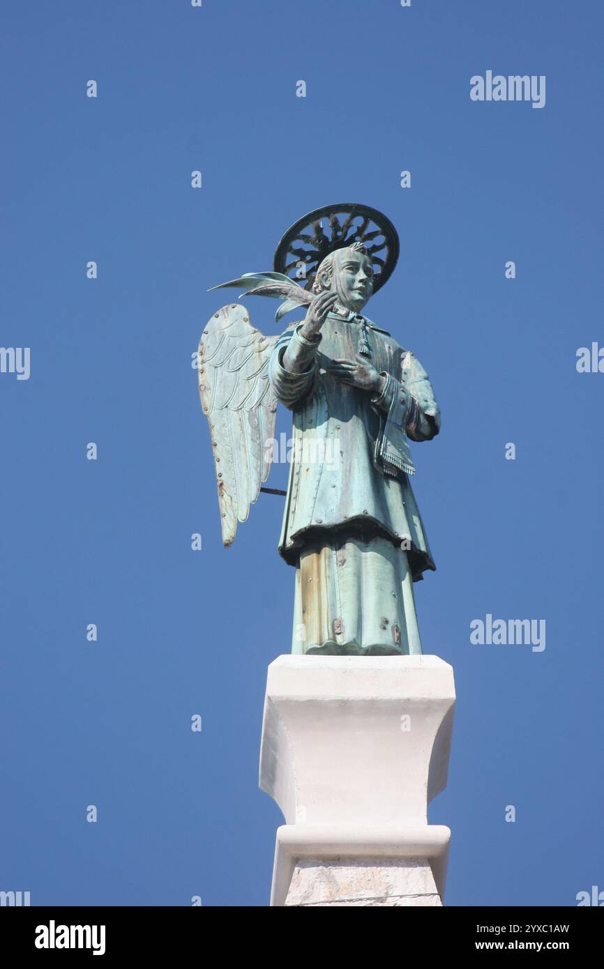 Statue of Saint Pelagius on the bell tower of the parish church of St. Pelagius in Novigrad, Croatia Stock Photo