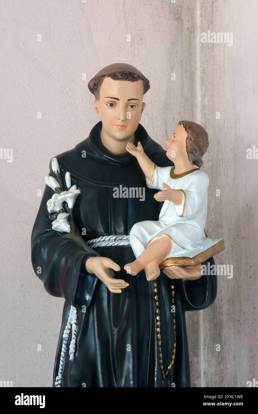 St. Anthony of Padua, statue in the parish church of the Immaculate Heart of Mary in Slavonski Brod, Croatia Stock Photo