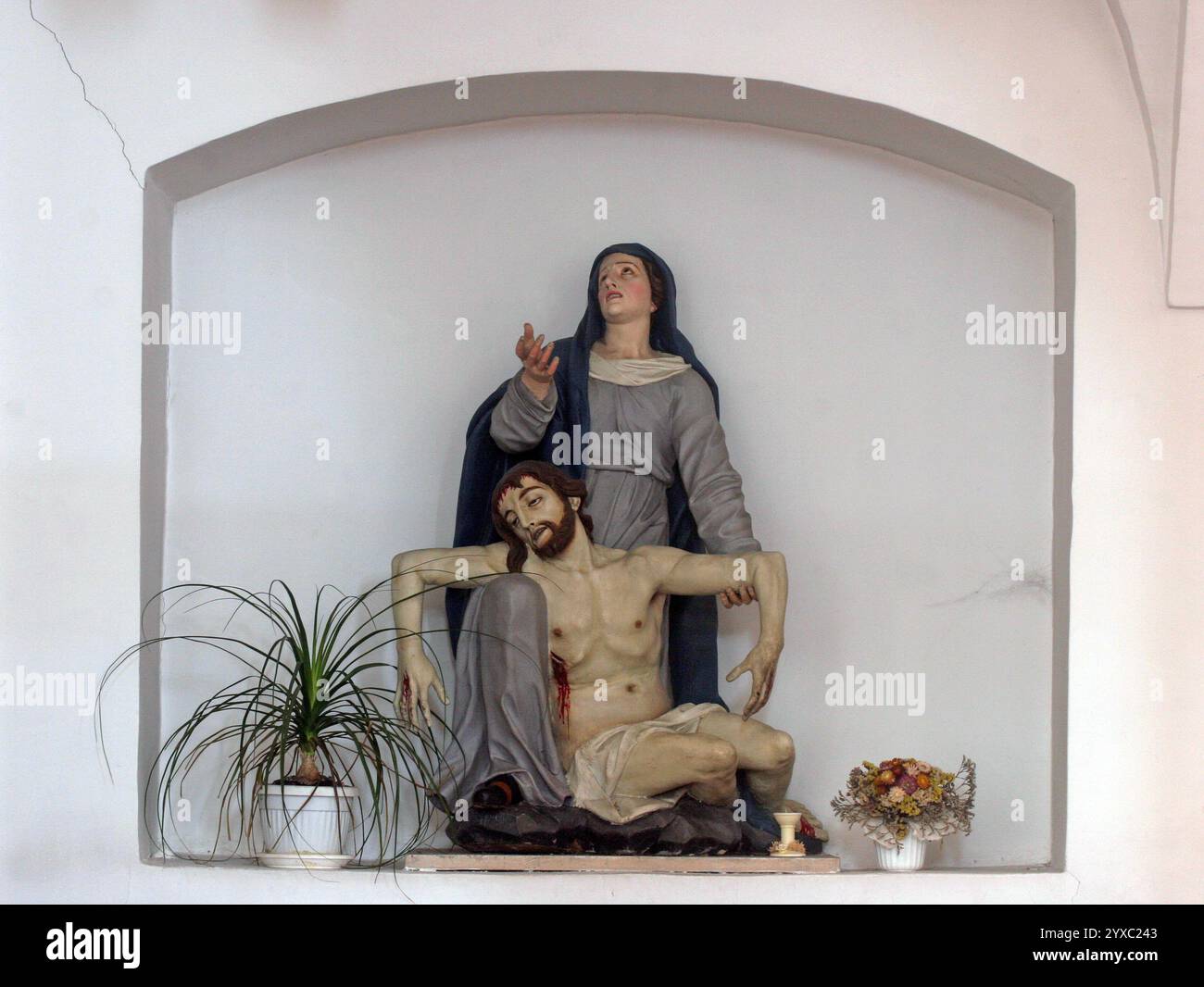 Our Lady of Sorrows, statue in the Franciscan Church of the Holy Trinity in Slavonski Brod, Croatia Stock Photo