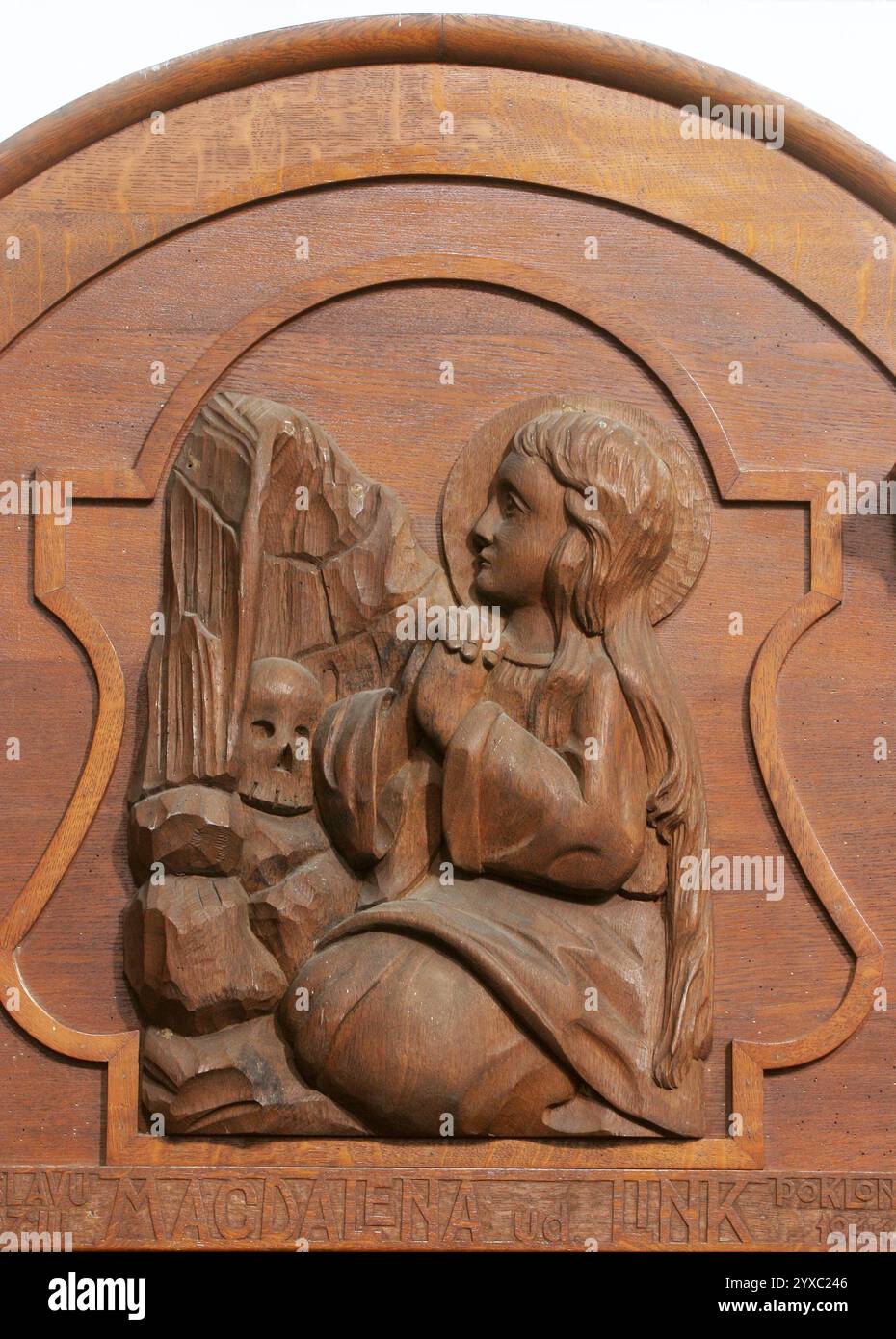 Saint Mary Magdalene, relief on the confessional in the Franciscan Church of the Holy Trinity in Slavonski Brod, Croatia Stock Photo