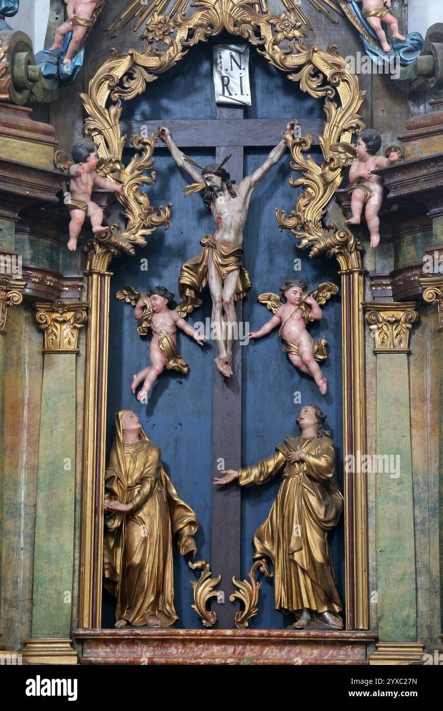 Altar of the Exaltation of the Holy Cross in the Franciscan Church of the Holy Trinity in Slavonski Brod, Croatia Stock Photo