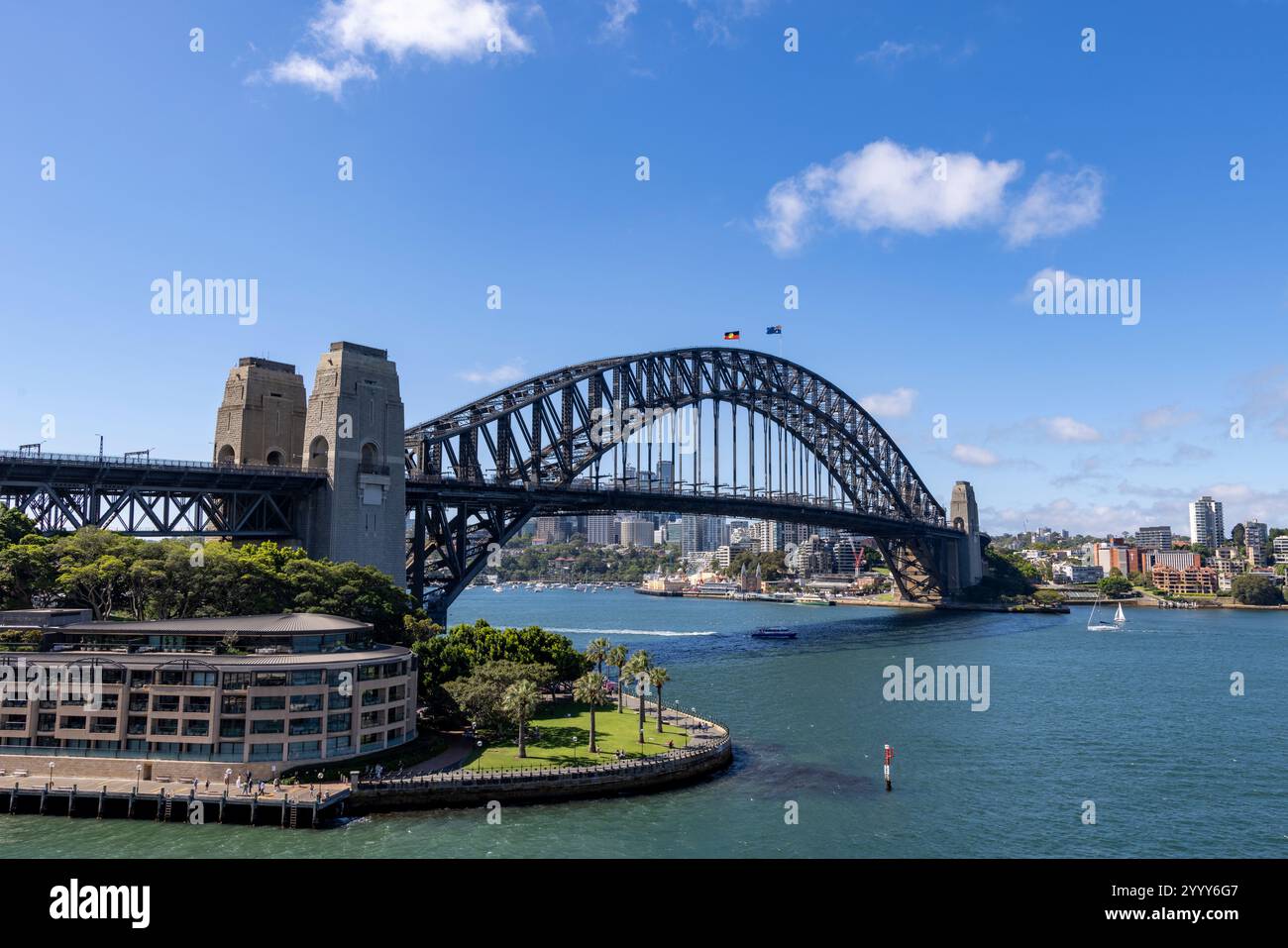 Sydney Harbour bridge structure spanning Sydney harbour with views of Park Hyatt hotel and North Sydney,NSW,Australia,2024 Stock Photo