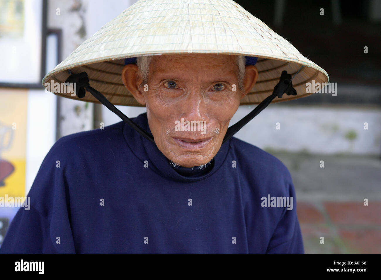 An old man in Hoi An Vietnam Stock Photo