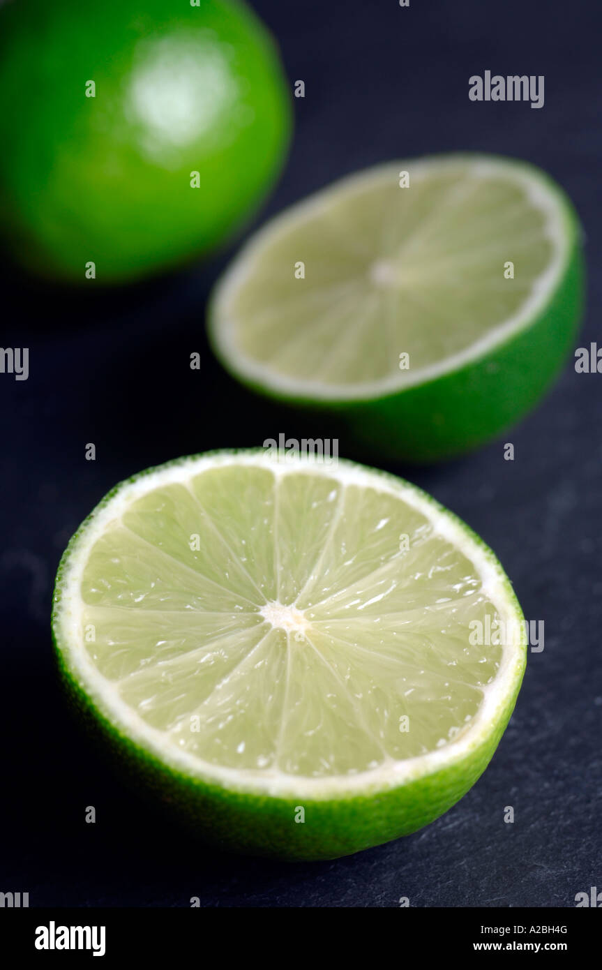 Limes on slate Stock Photo