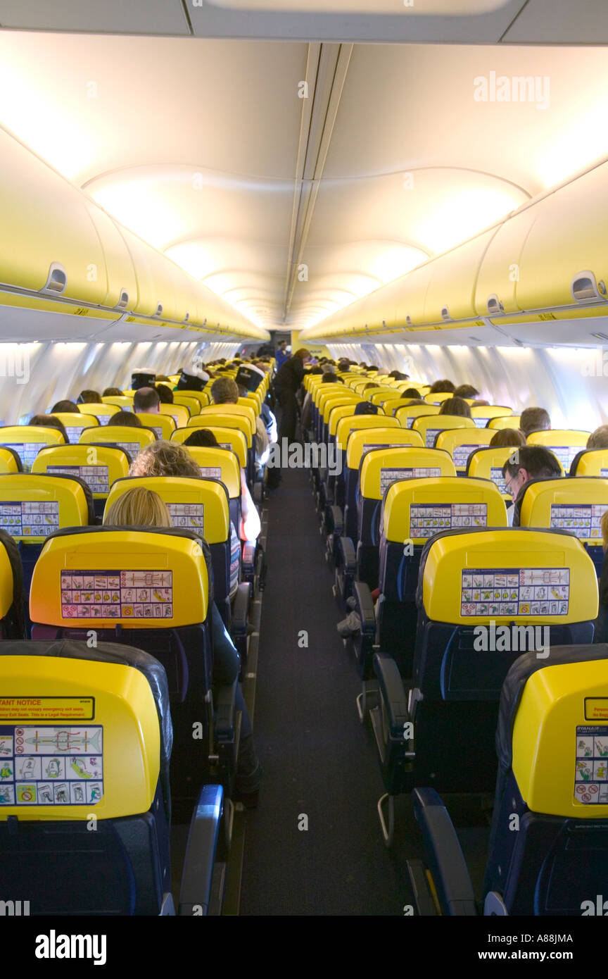 Passengers airplane overhead lockers hi-res stock photography and ...