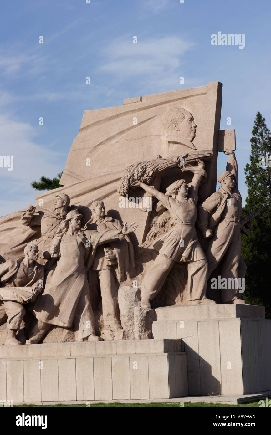 Monument to the peoples heroes people in front of Mao Zedong s Mausoleum Tiananmen Square Beijing China Stock Photo