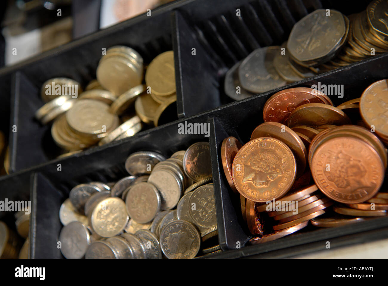 Coins in a shop till Stock Photo