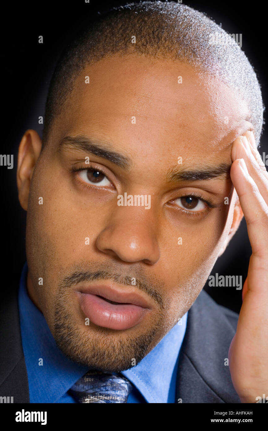 Black man relieved to hear the news Stock Photo