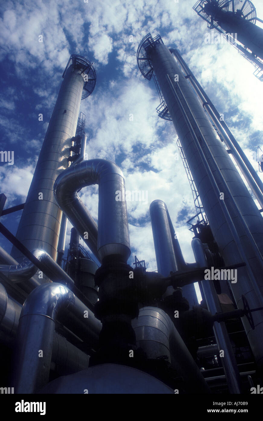 Cracking towers in petrochemical plant Stock Photo