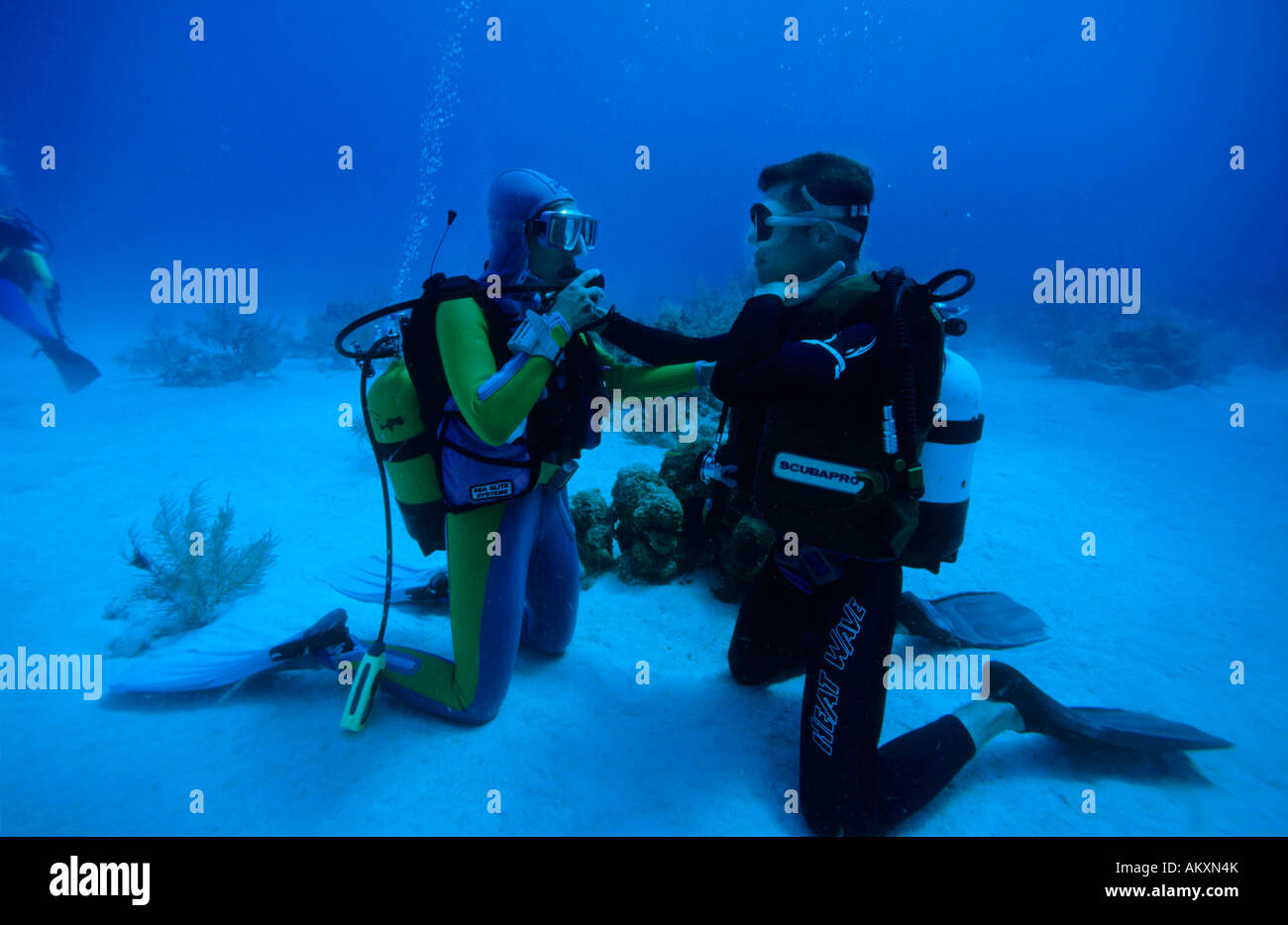 Diving teachers and pupils train the respiration, the Caribbean. Stock Photo