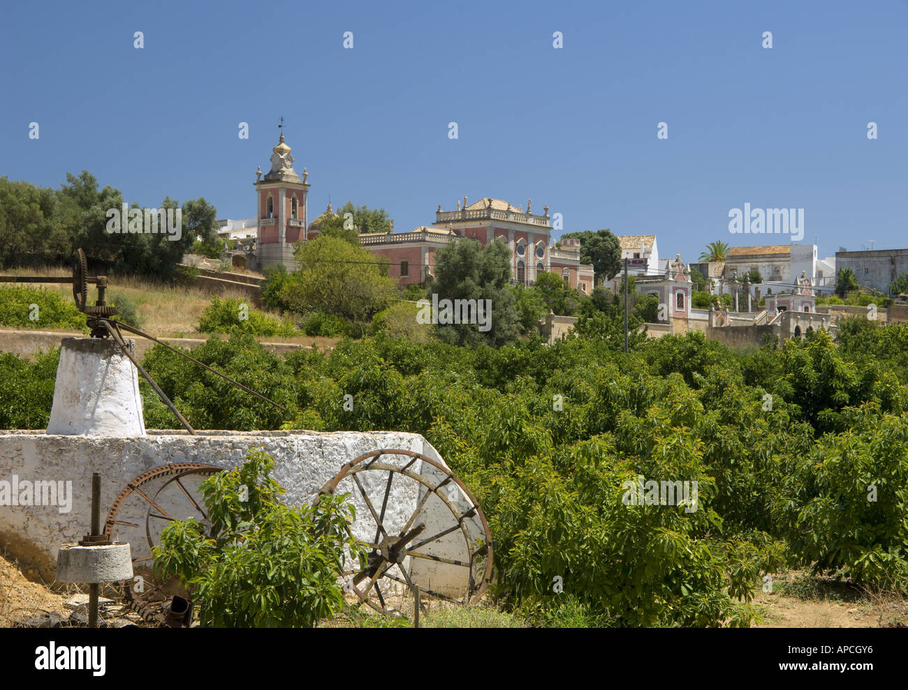 An Old Well With Estoi Village And Palace Stock Photo