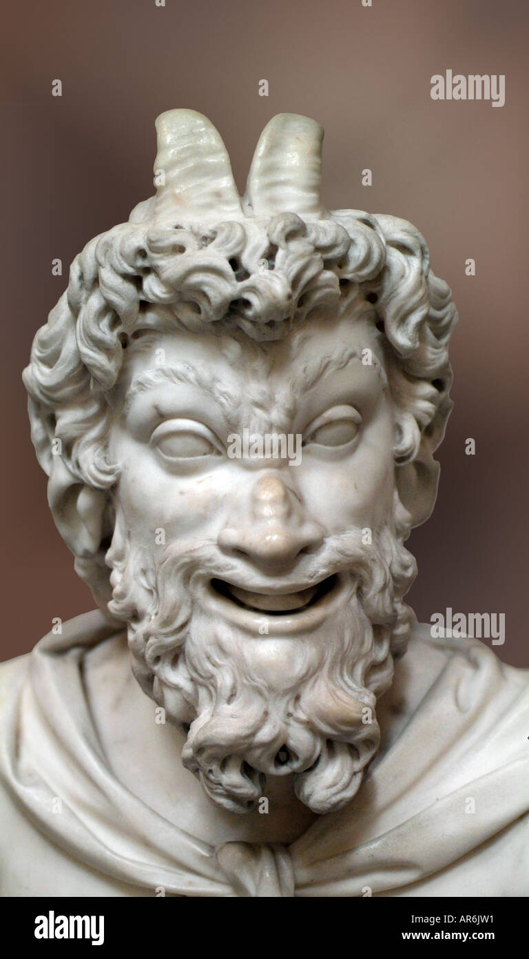 Pan Greek god goat horn head shoulder bust curly curl beard hair white marble carve expression expressive open mouth Stock Photo