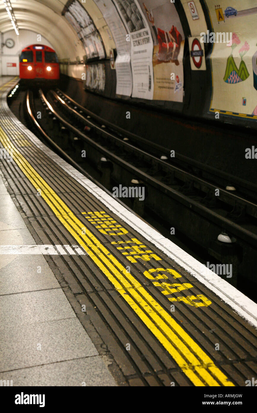 Mind The Gap written on the Bakerloo Line platform at Waterloo Tube Station, London Stock Photo