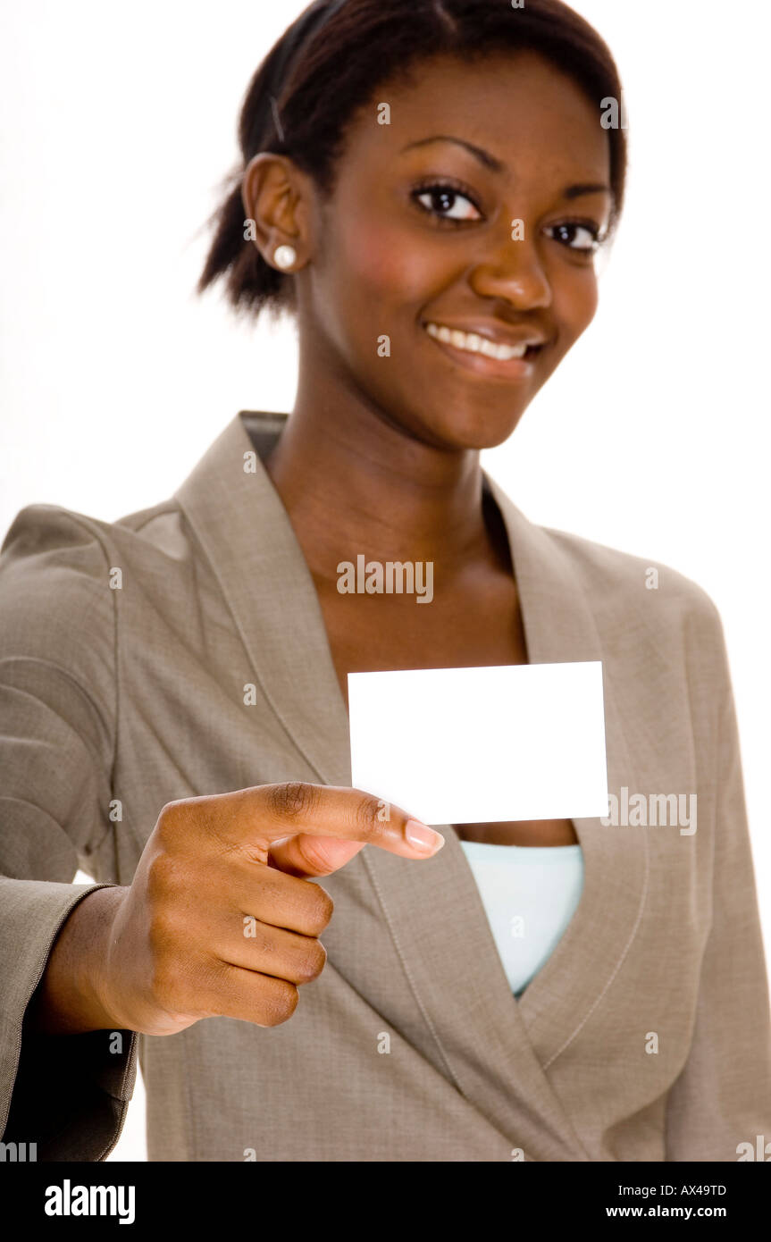 a young black woman holds up a business card Stock Photo