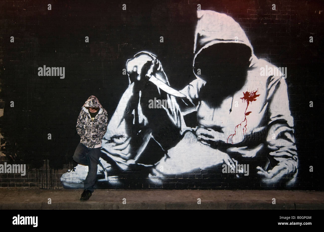 Graffiti of a hoodie by Banksy at the Cans Festival in Waterloo London England UK Stock Photo