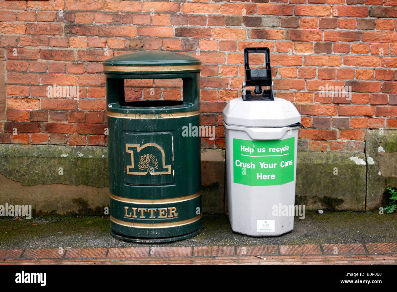 Litter bin and can crusher 23rd March 2008 Rufford Abbey and Country Park Nottinghamshire UK Stock Photo