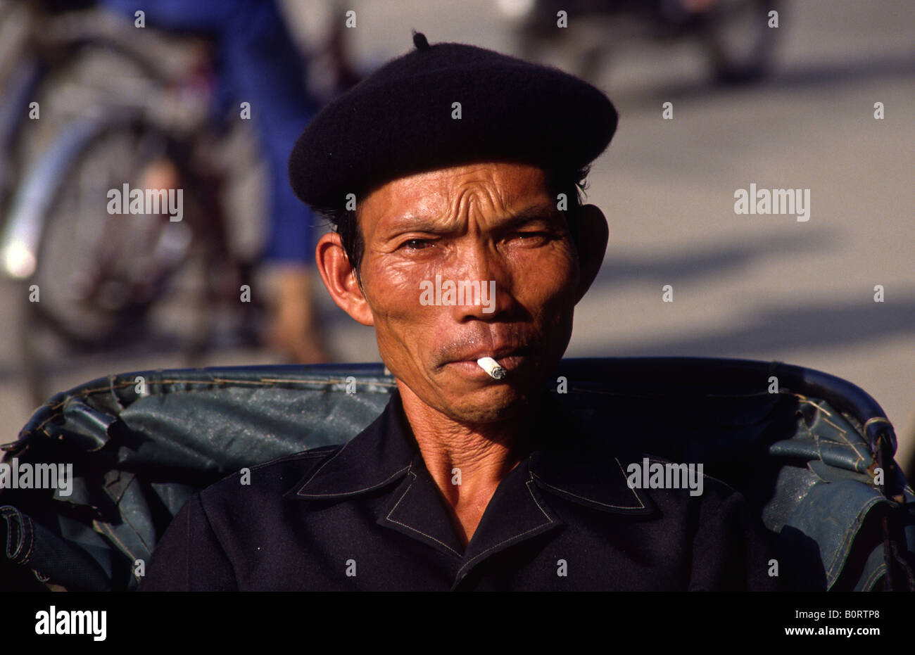 Cyclo driver. Hué. Vietnam. Stock Photo