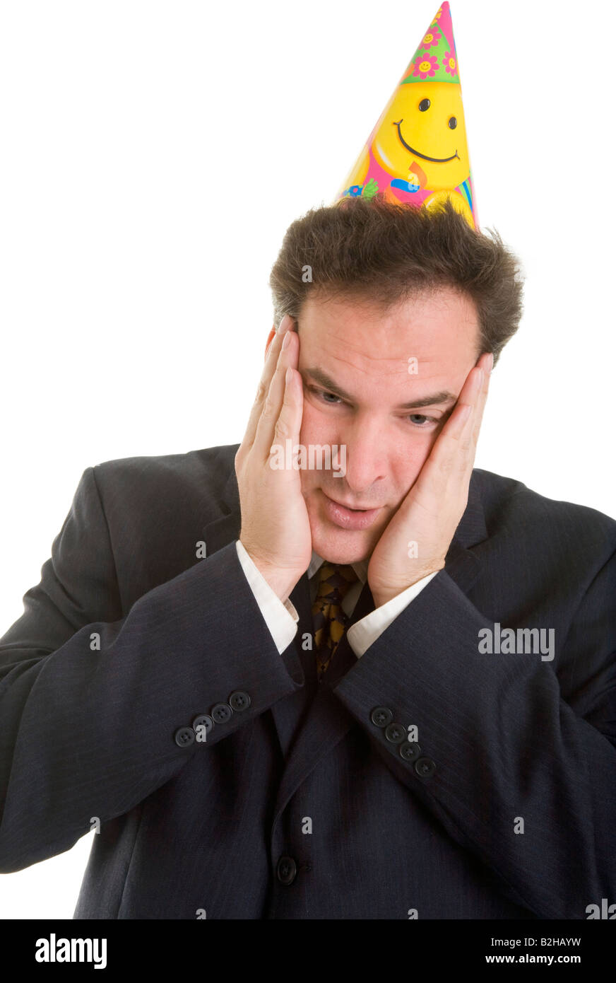 businessman tradesman salesman carnival party hat Stock Photo