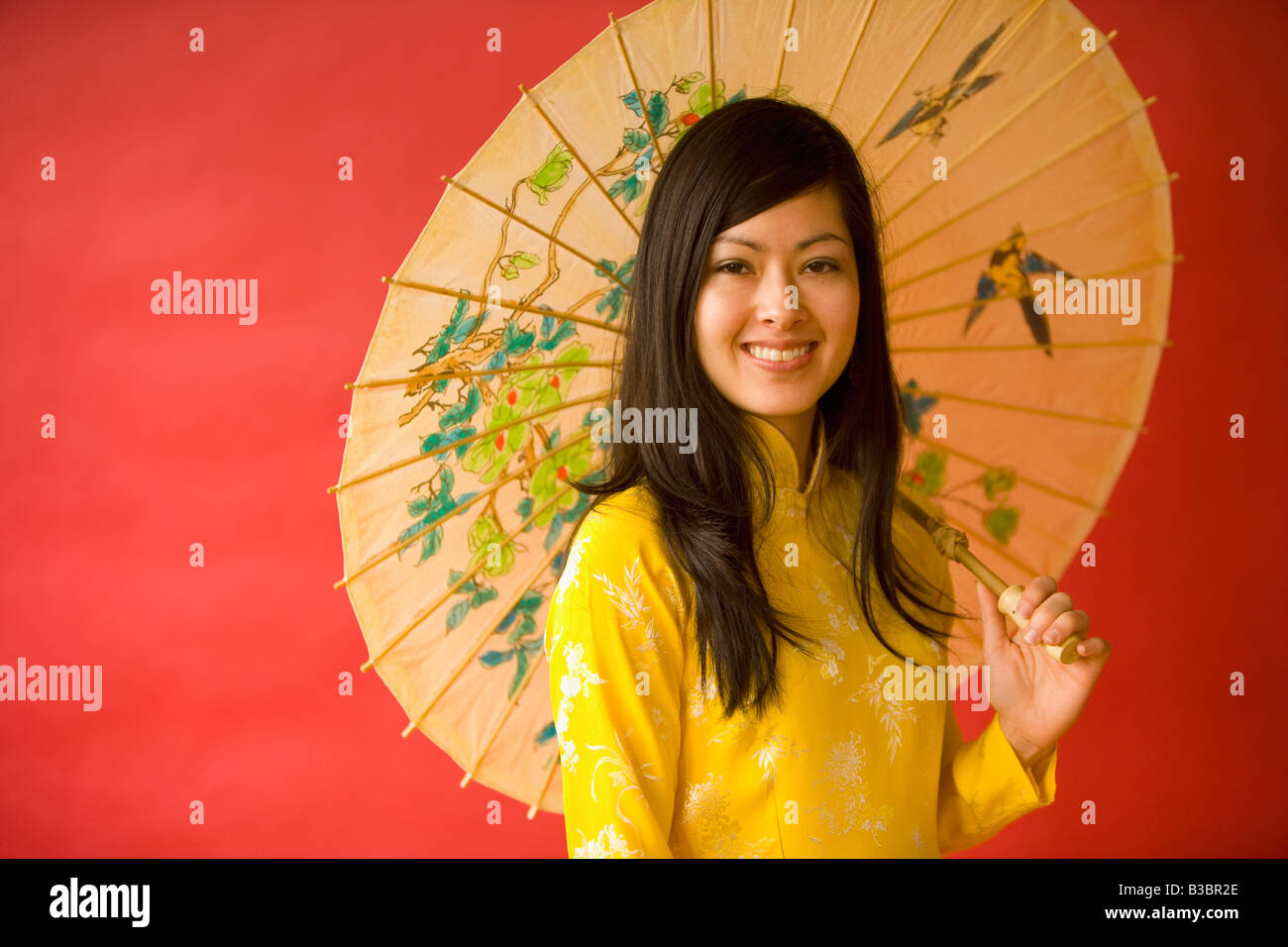 Asian woman holding parasol Stock Photo