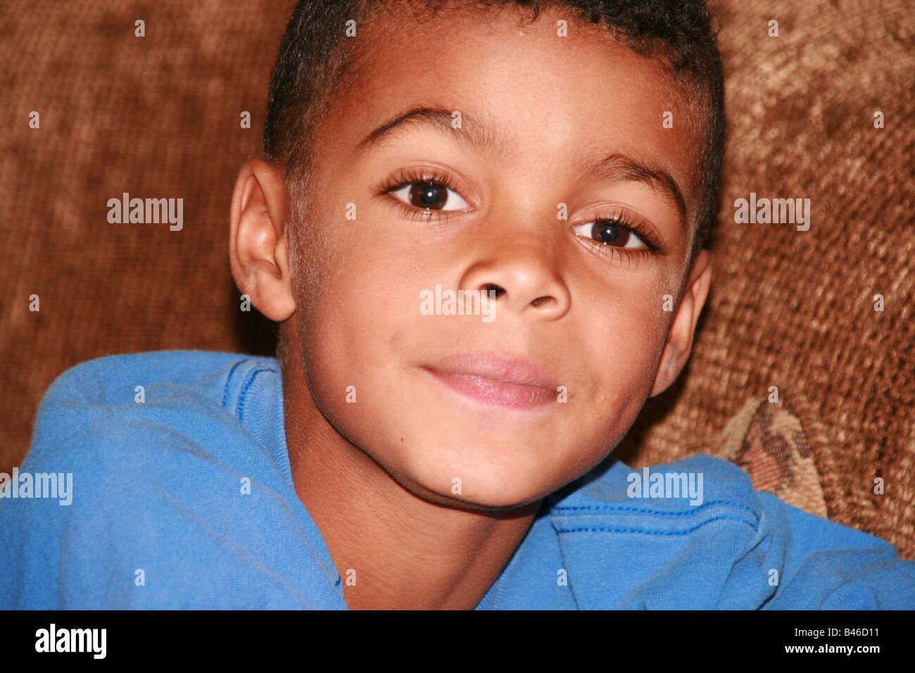 Cute, young mixed race boy Stock Photo - Alamy