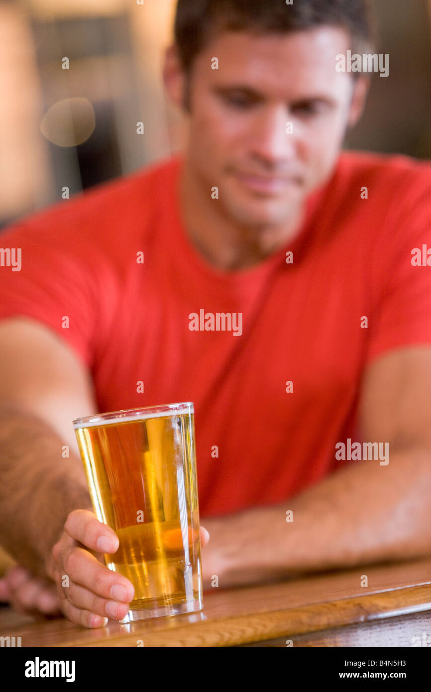 Man having a glass of beer Stock Photo