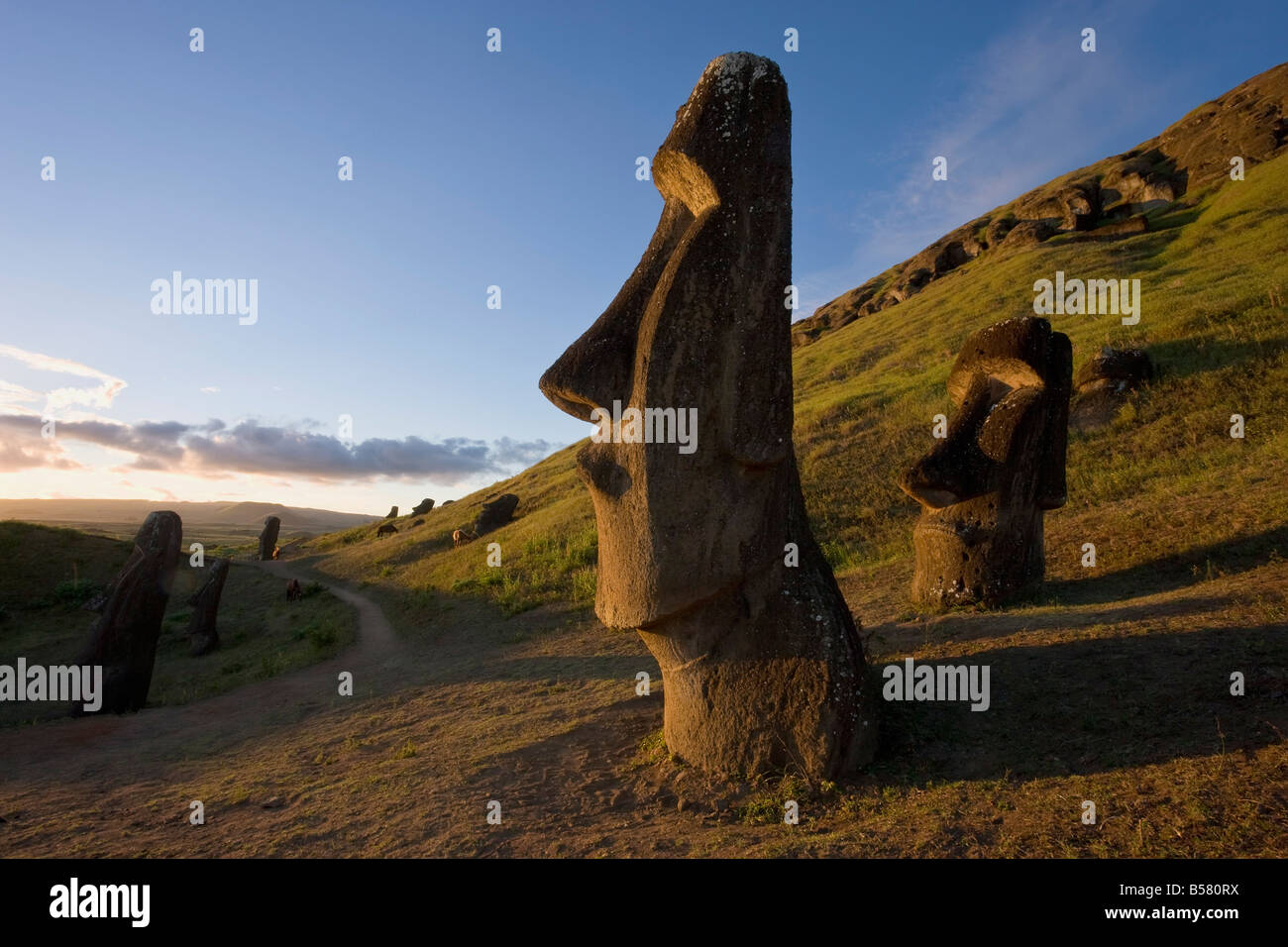 Giant monolithic stone Moai statues at Rano Raraku, Rapa Nui (Easter Island), UNESCO World Heritage Site, Chile, South America Stock Photo