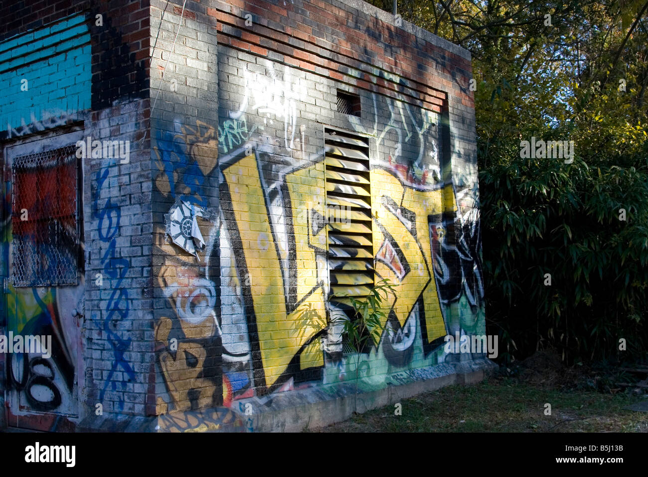 Vandalized brick pump house Stock Photo