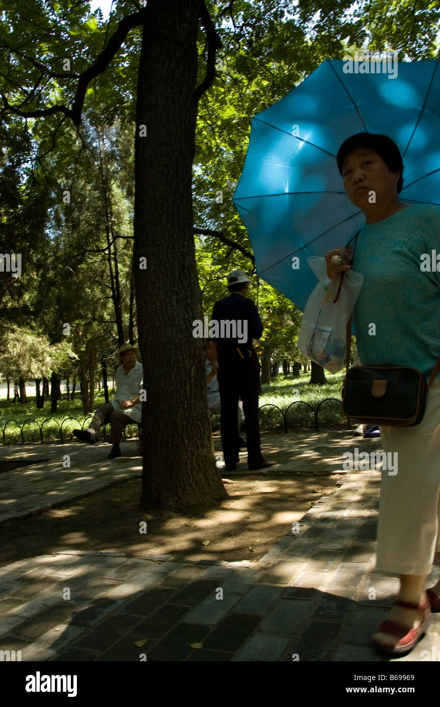 woman with parasol Stock Photo