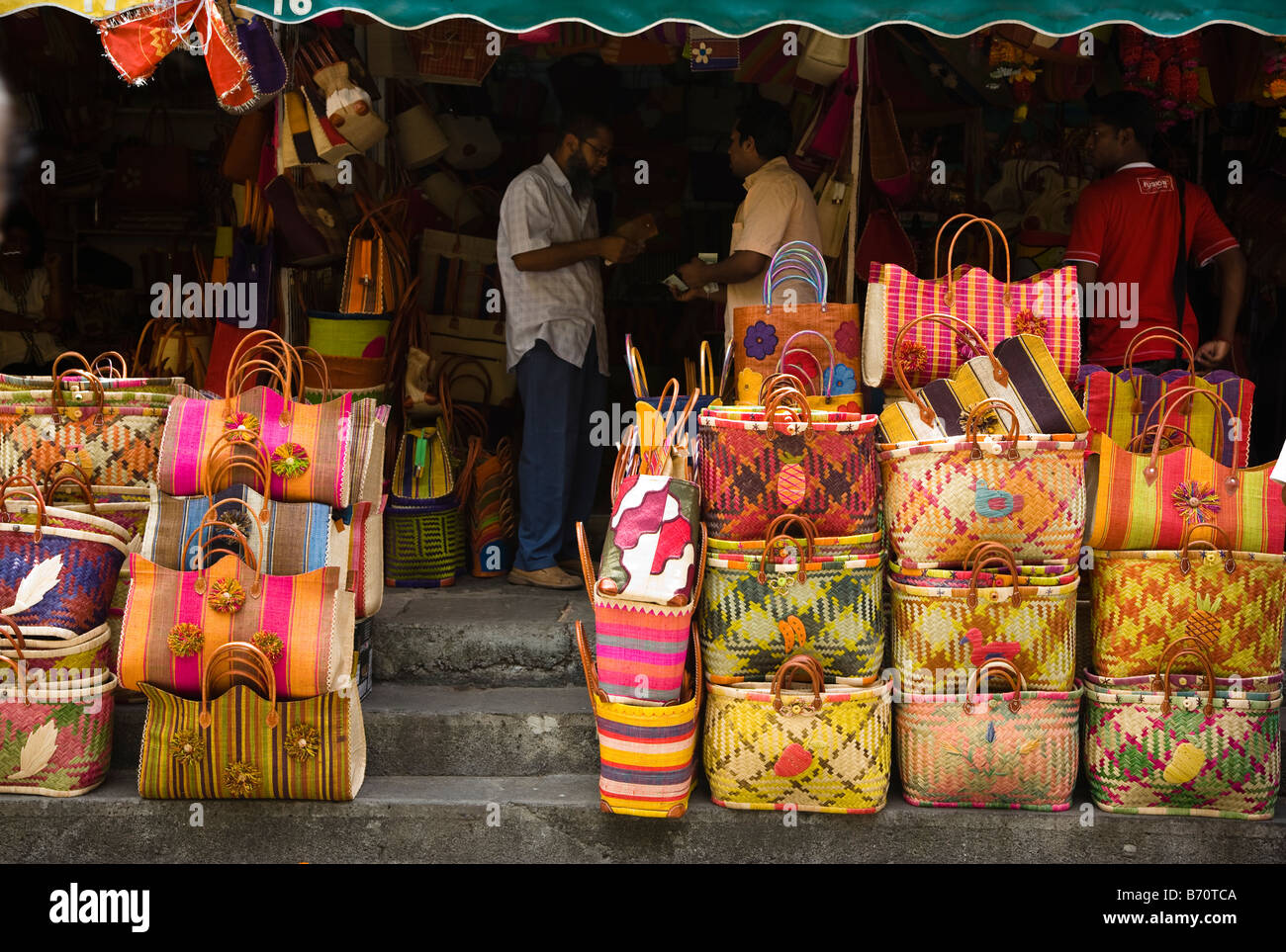 Stall selling wicker handbags in the street market at Port Louis Mauritius Stock Photo