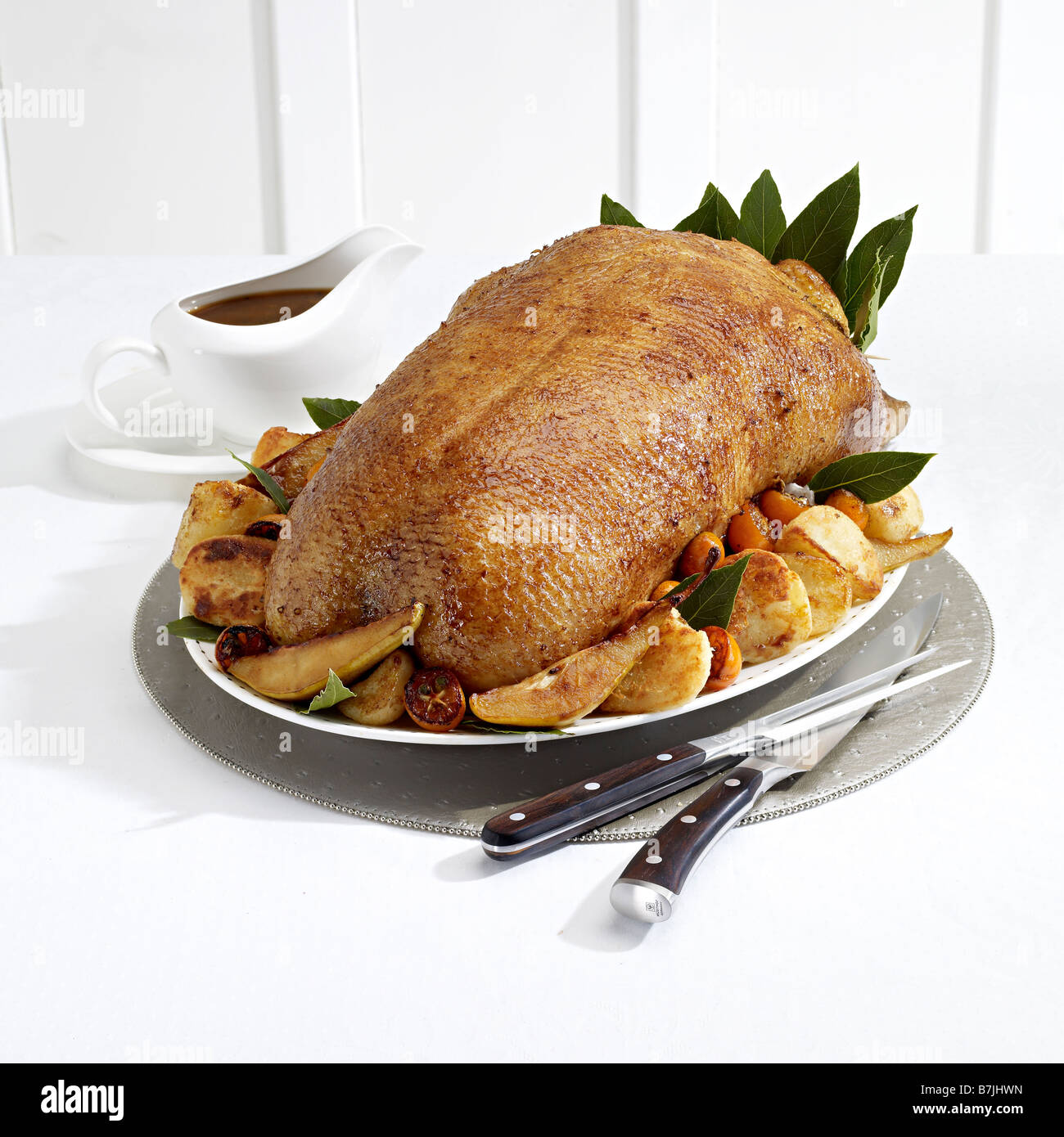 roast goose trimmings carving set Stock Photo