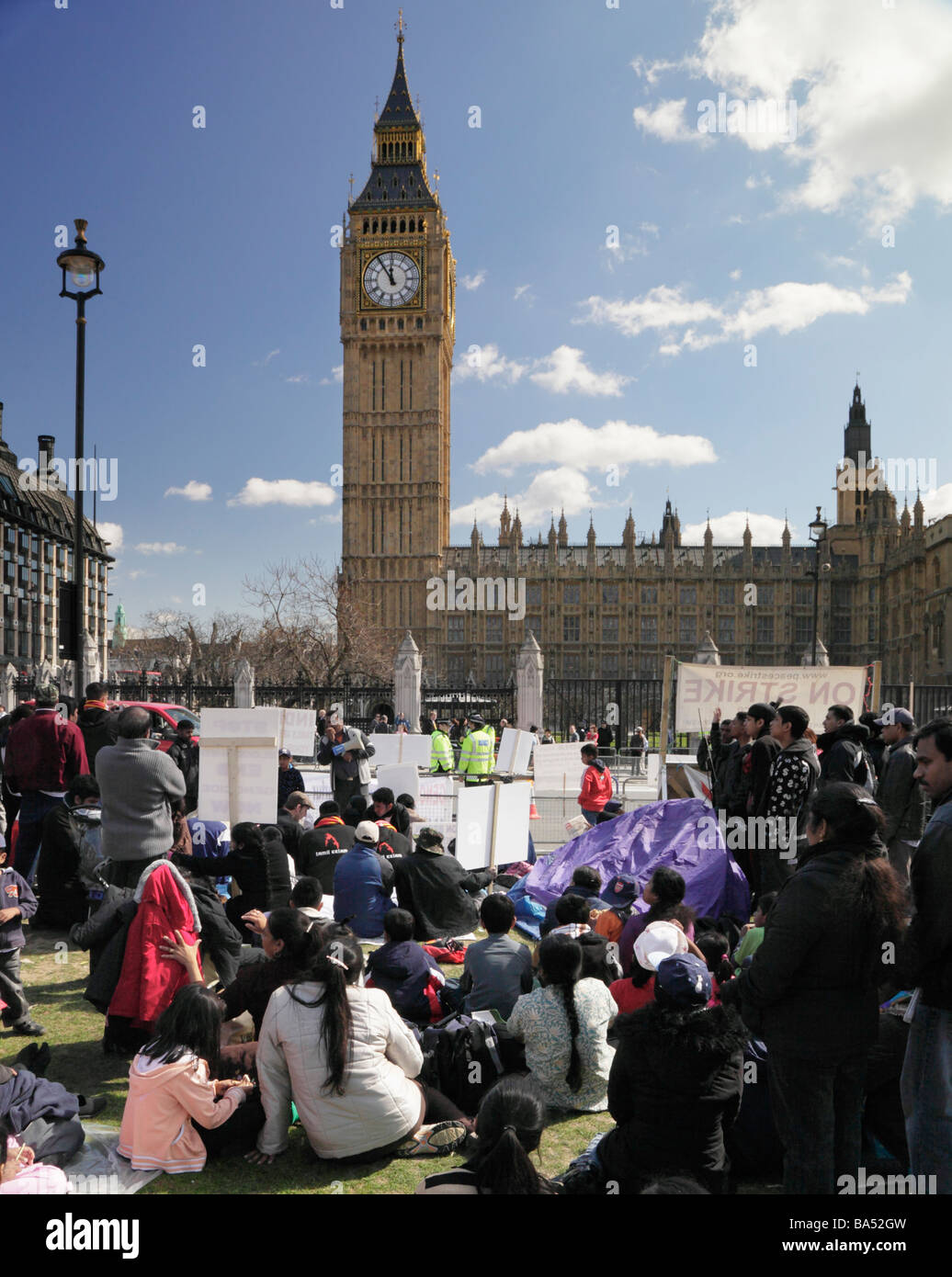 Group of Tamil protesters demonstrating over the fighting in Sri Lanka, outside Parliament Square, London England, UK. Stock Photo