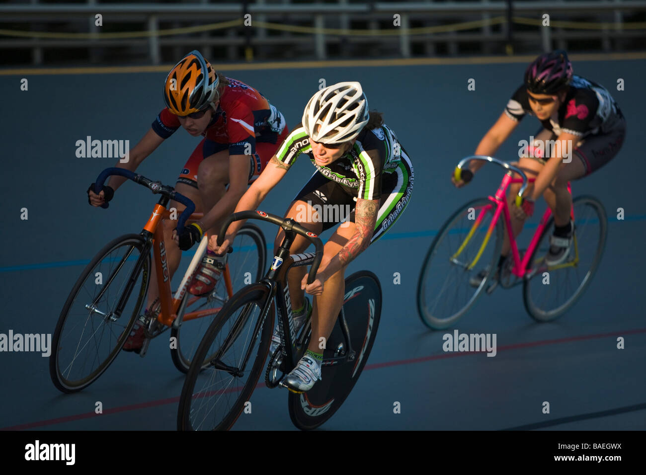 ILLINOIS Northbrook Group of women cyclists on curve in bicycle race at velodrome track Stock Photo