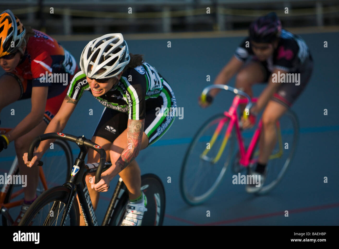 ILLINOIS Northbrook Group of women cyclists on curve in bicycle race at velodrome track Stock Photo