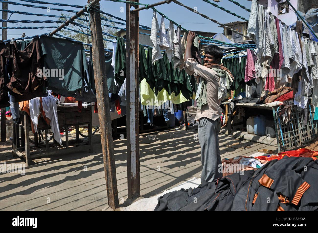 Hanging out laundry in a colour coded sequence at the Dhoby Ghat in Mumbai, India Stock Photo