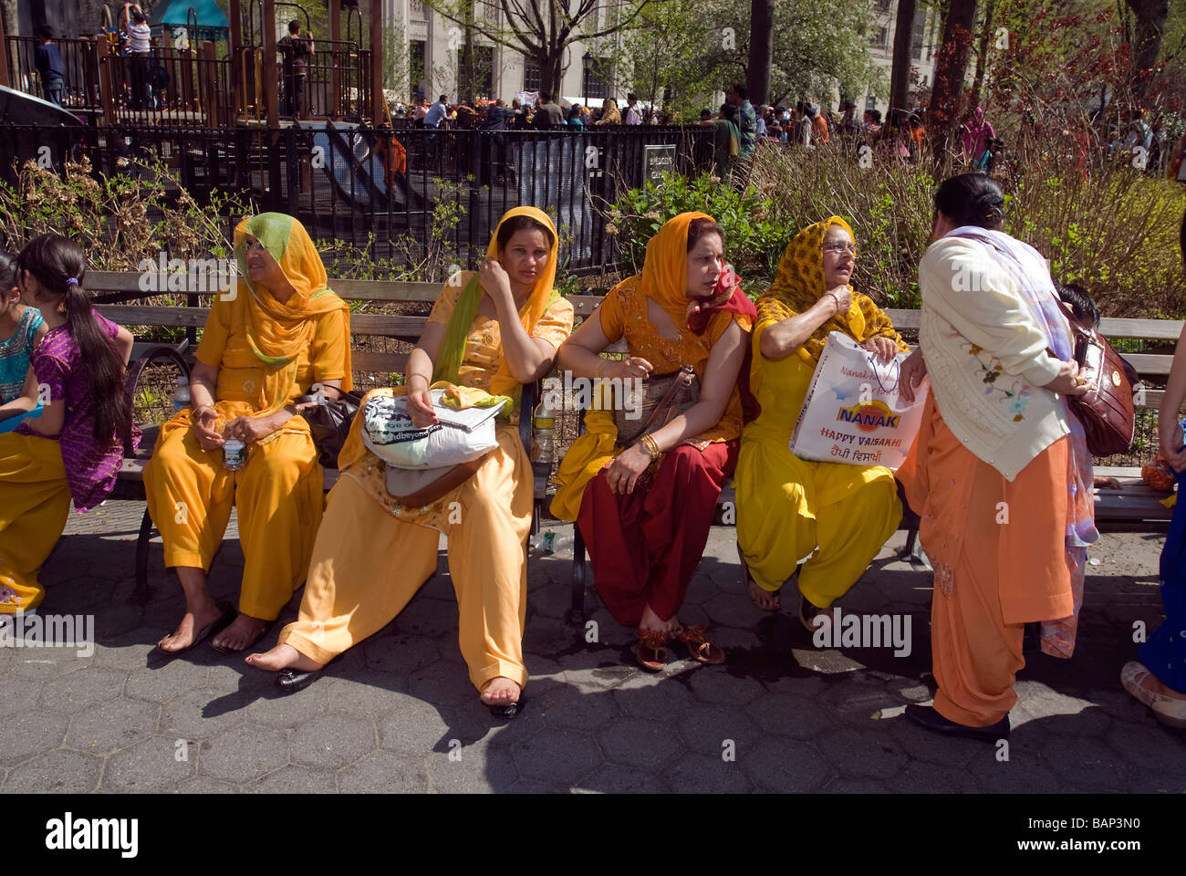 Sikh women rest in Madison Square Park after the 22nd Annual Sikh Day Parade in New York Stock Photo