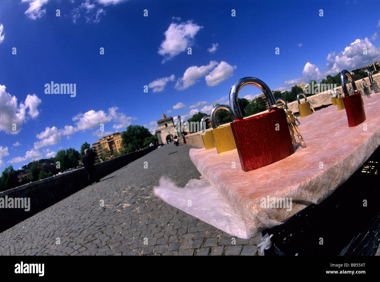 Milvio Bridge on Tiber River, Rome, Italy. The lovers leave on the bridge closed padlock. Stock Photo