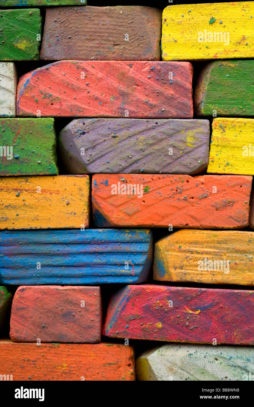 a brickwall of used colored chalks Stock Photo