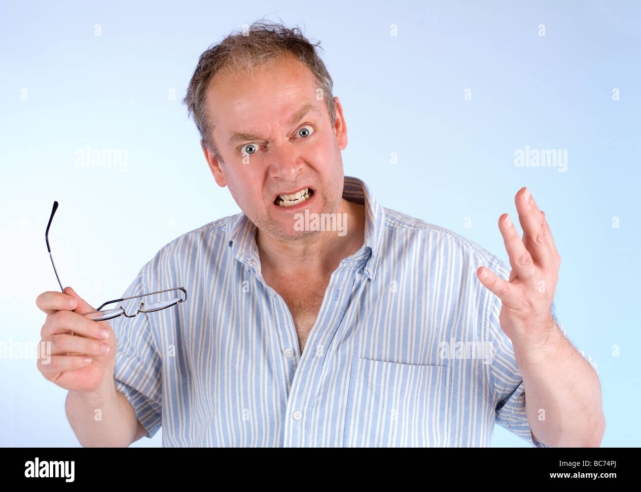 A man is showing his anger about something Stock Photo