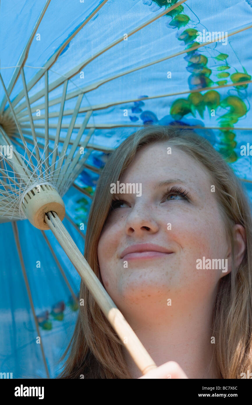 Woman with parasol - Stock Photo