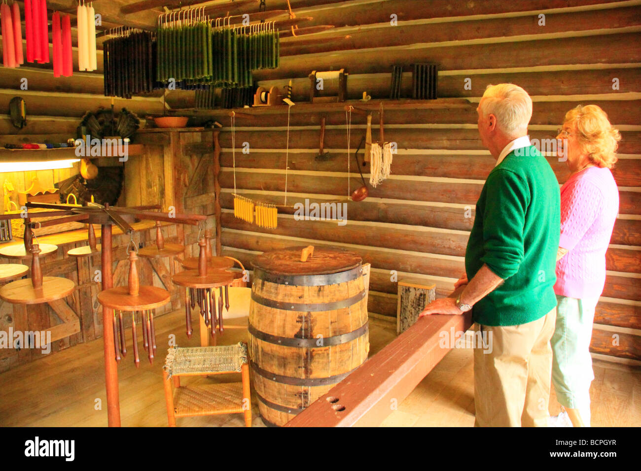 Tourists in candle maker s cabin Fort Boonesborough State Park Richmond Kentucky Stock Photo