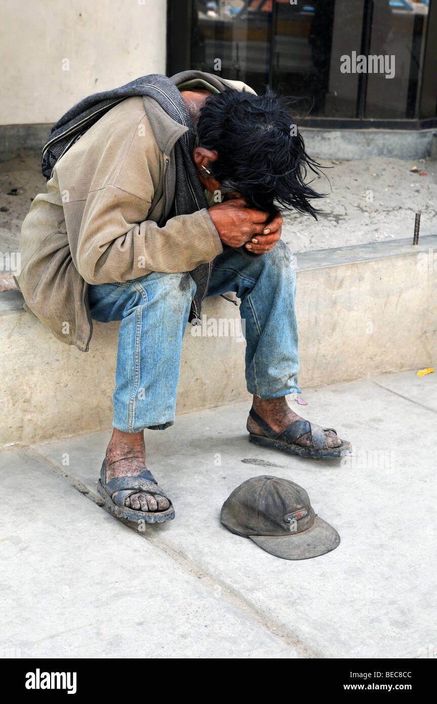 CAJABAMBA PERU - SEPTEMBER 6: Poor man with hands on face in Cajabamba, Peru on September 6, 2009 Stock Photo