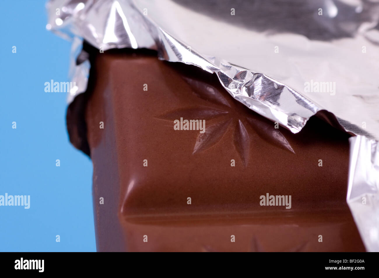 Block of Chocolate with silver wrapper Stock Photo