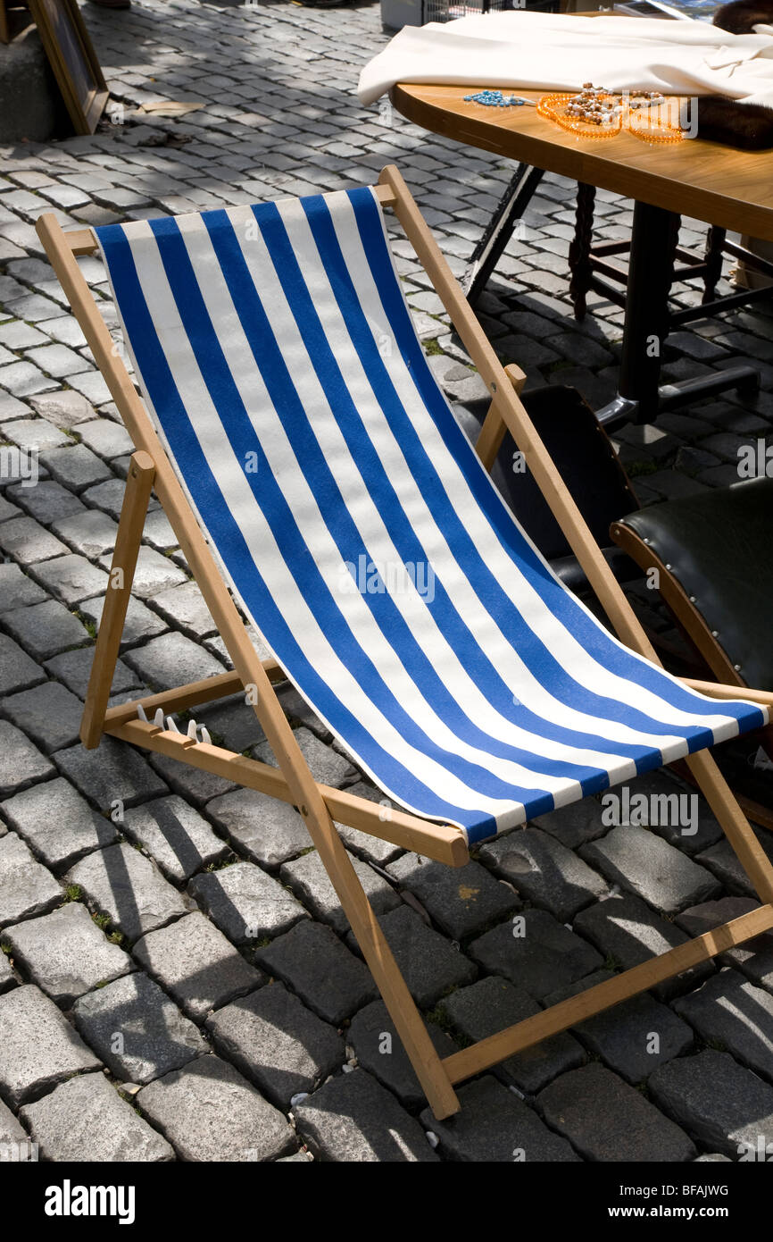 Deck Chair on Cobbled Stones Stock Photo