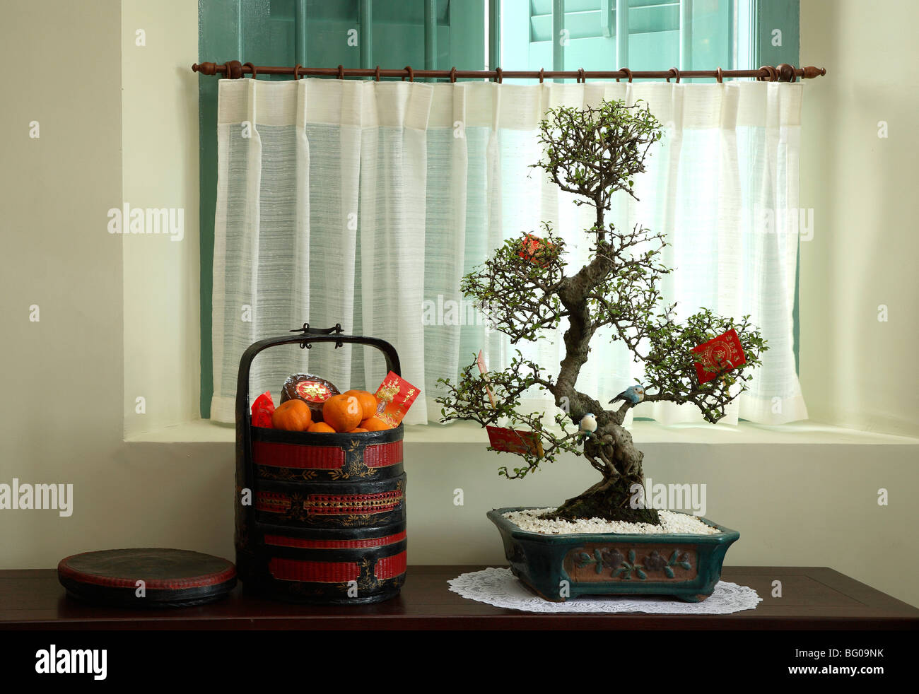 Chinese New Year decoration with oranges and red packet Stock Photo