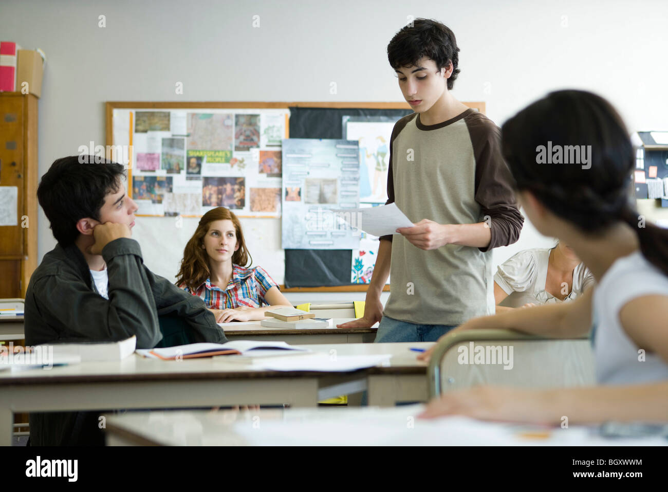 High school student giving presentation in class Stock Photo