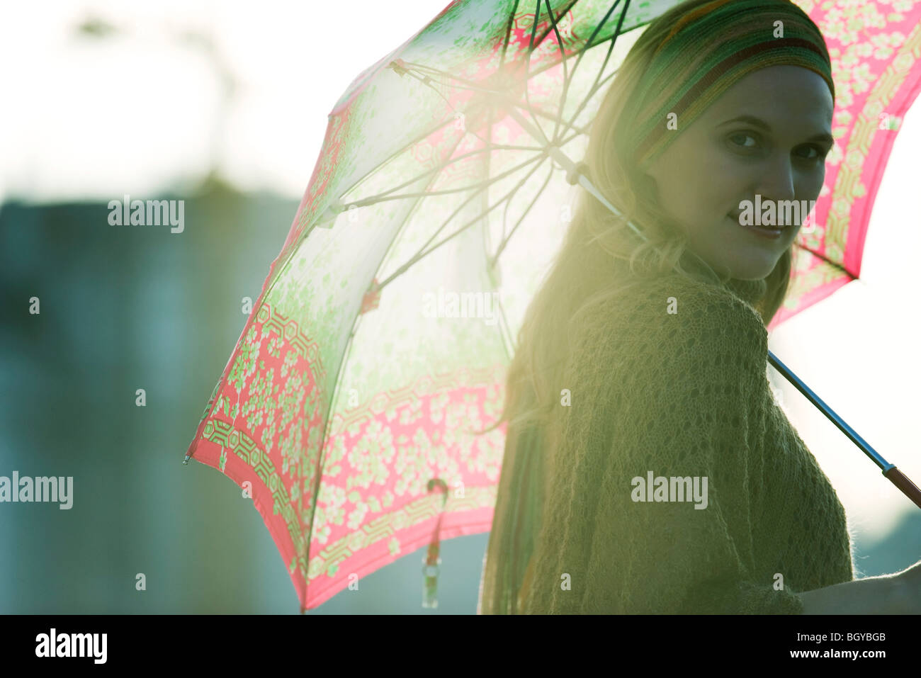 Woman with parasol, portrait Stock Photo