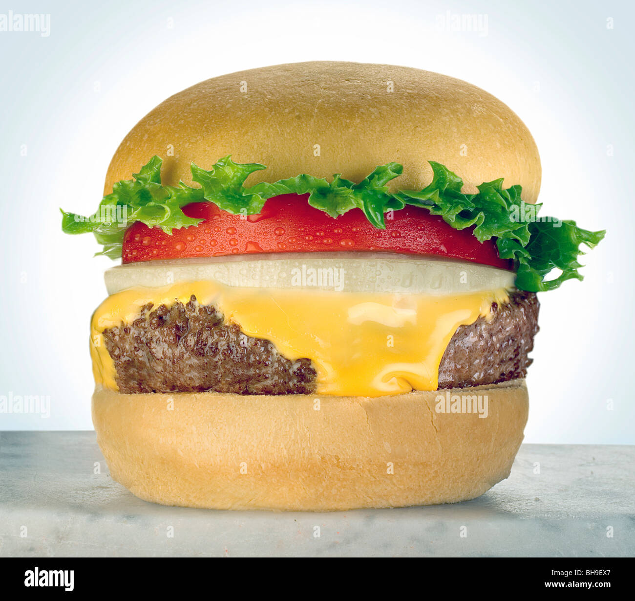 Cheeseburger with tomato Stock Photo