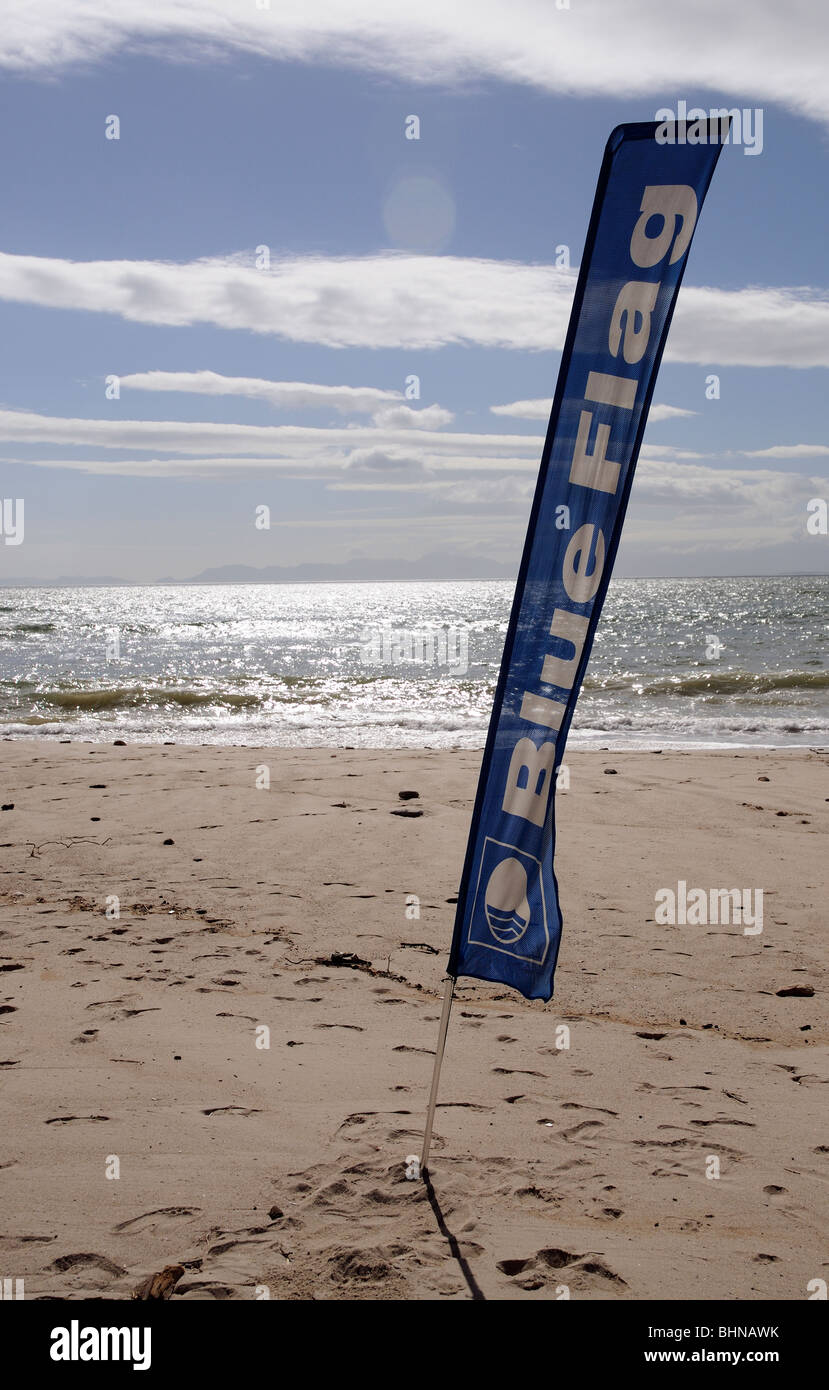 Blue Flag beach flag flying on Bikini Beach at Gordons Bay Cape Province South Africa Stock Photo